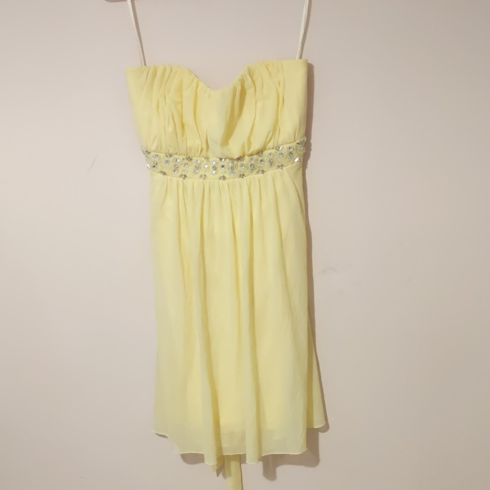 Strapless yellow empire waist dress